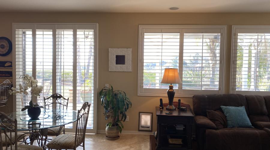 Bi-fold shutters on sliding glass door